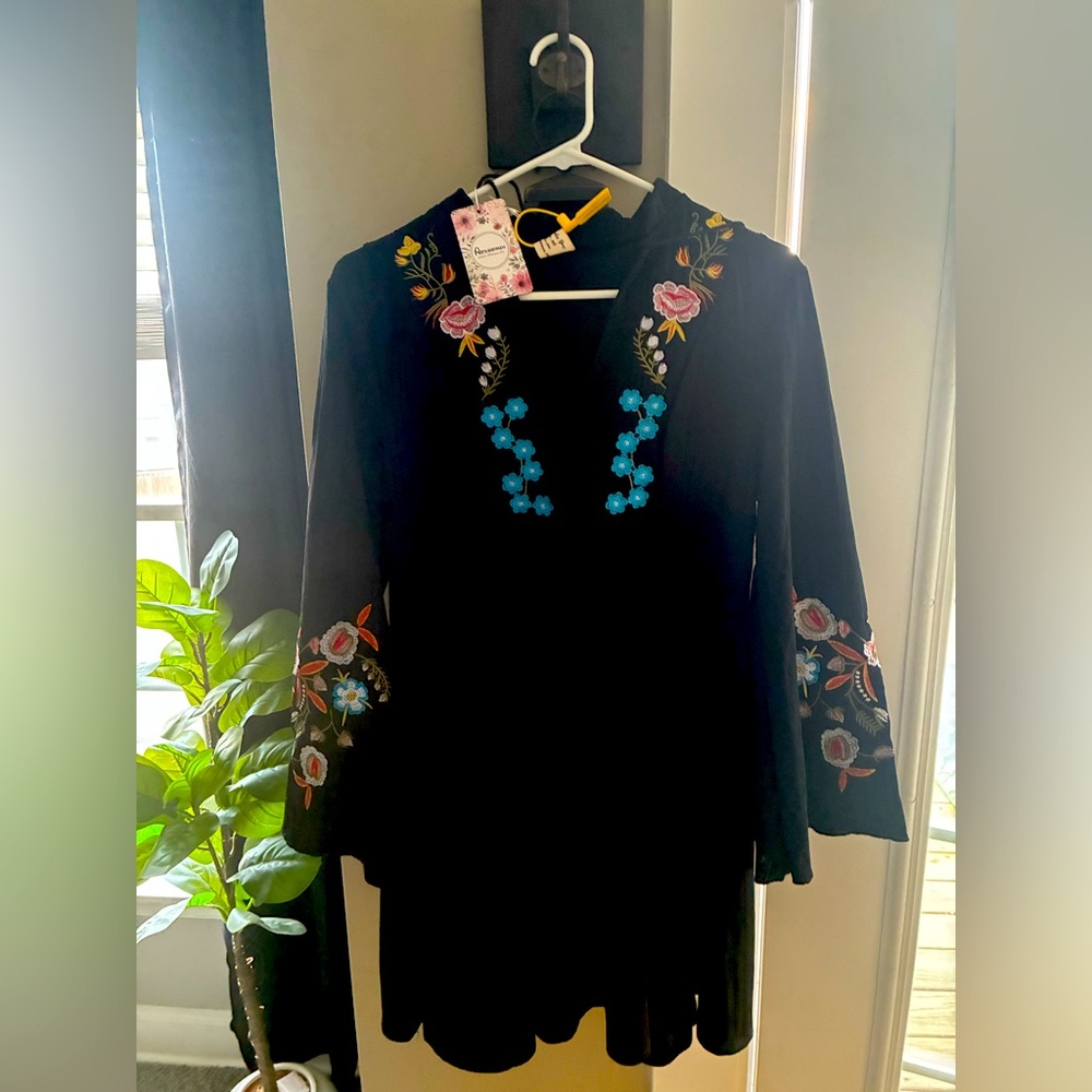 Embroidered baby doll dress never worn